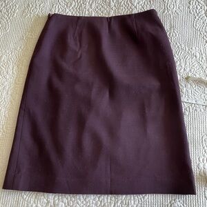 Kors Made in Italy aubergine wool straight skirt with front slit